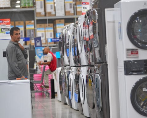 US economy grows at brisk 3.4% pace in third quarter on strong consumer spending and AI investment