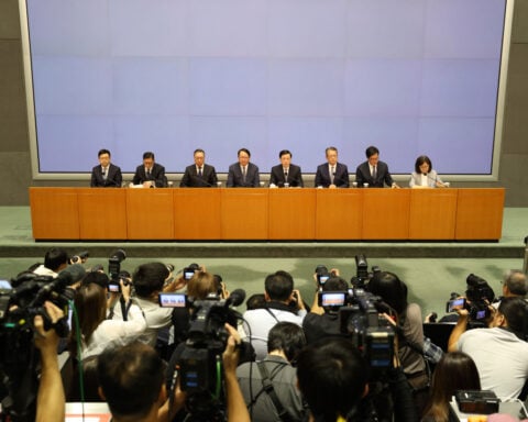 Hong Kong's housing minister resigns after fire investigation finds inadequate oversight