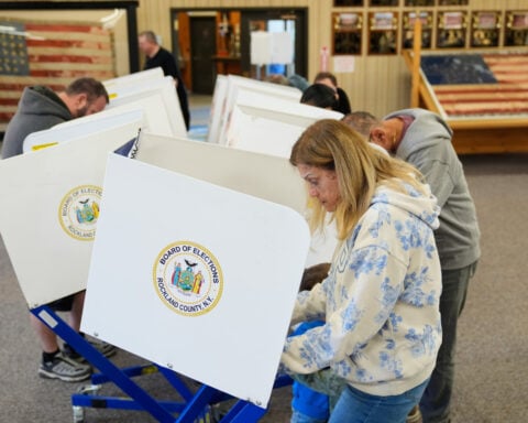 FACT FOCUS: Misinformation about voting spreads less than a week before Election Day