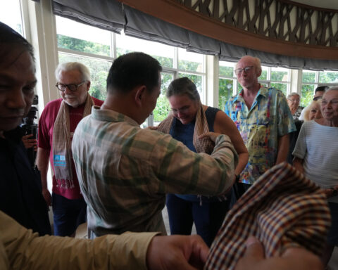 A US cruise ship suspends a global voyage in Asia due to fuel costs, stranding 200 passengers