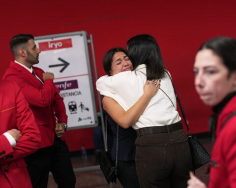 Families hold out hope for loved ones missing after deadly Spain train crash