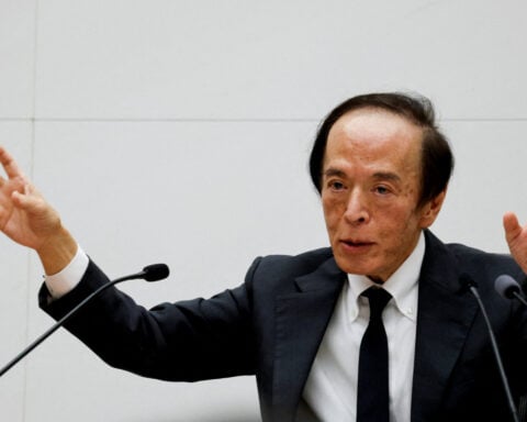 BOJ keeps interest rates steady, signals further rate hikes