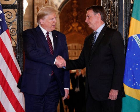 Trump not planning to back Bolsonaro's claim to be Brazil's leader, sources say