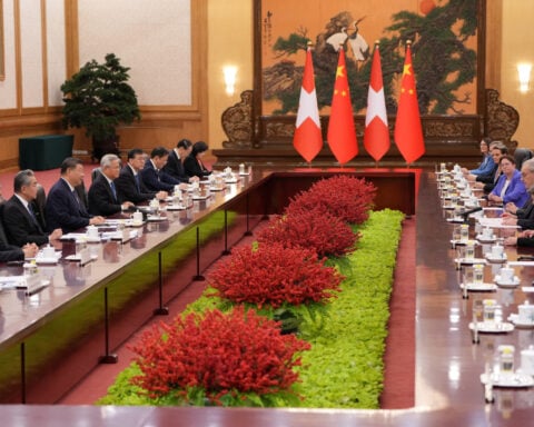China's Xi, Swiss president praise trade deal that boosts access