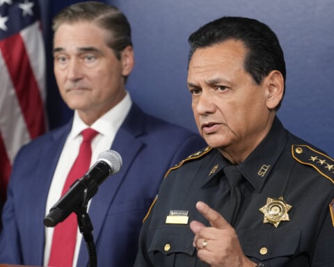 ICE agent charged with assault for hitting a fleeing man with his car will turn himself in on Monday
